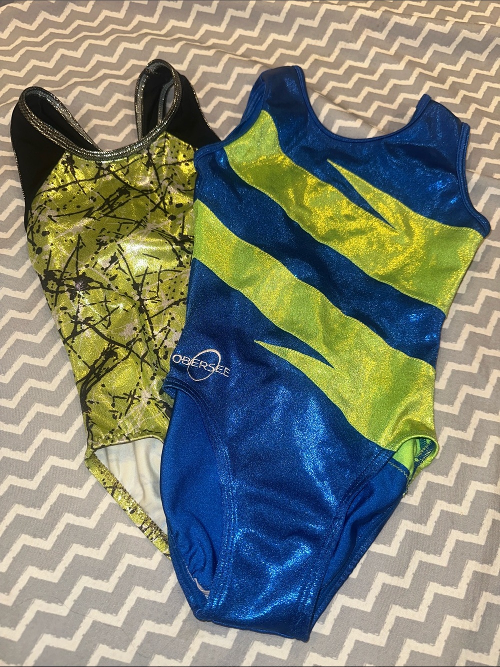 2 Leo’s Girls M  Blue and Lime  and Lime with black splatter Gymnastics Leotard